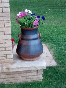 pottery flowers bricks on left